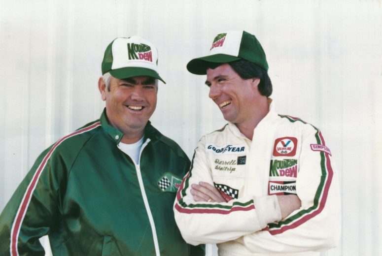 Darrell Waltrip laughs with Junior Johnson.