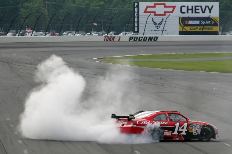 Kurt Busch does a burnout a Pocono Raceway.