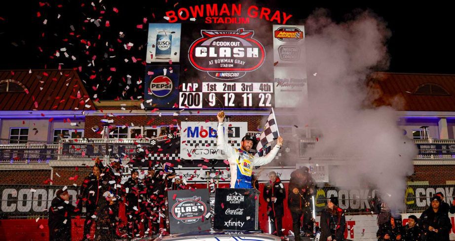 Chase Elliott celebrates in Victory Lane at Bowman Gray Stadium.