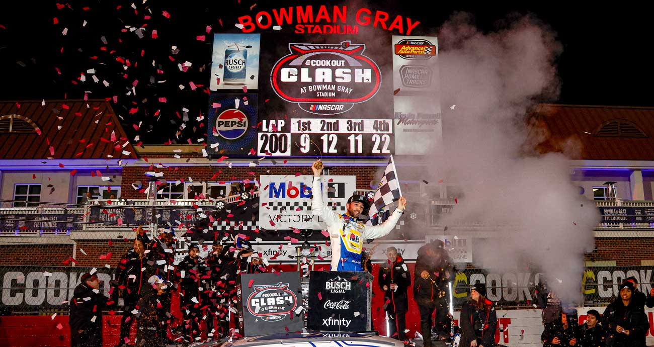 Chase Elliott celebrates in Victory Lane at Bowman Gray Stadium.