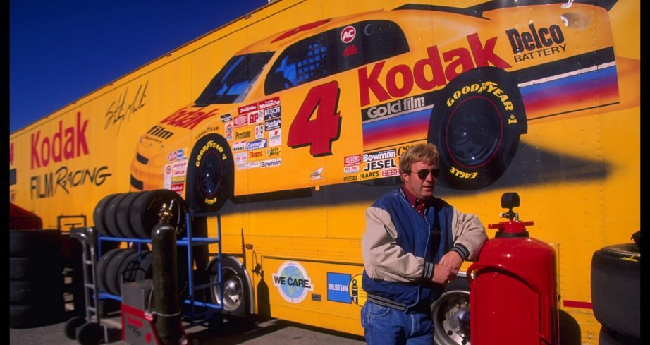 Sterling Marlin looks on with the No. 4 Kodak Hauler behind him.