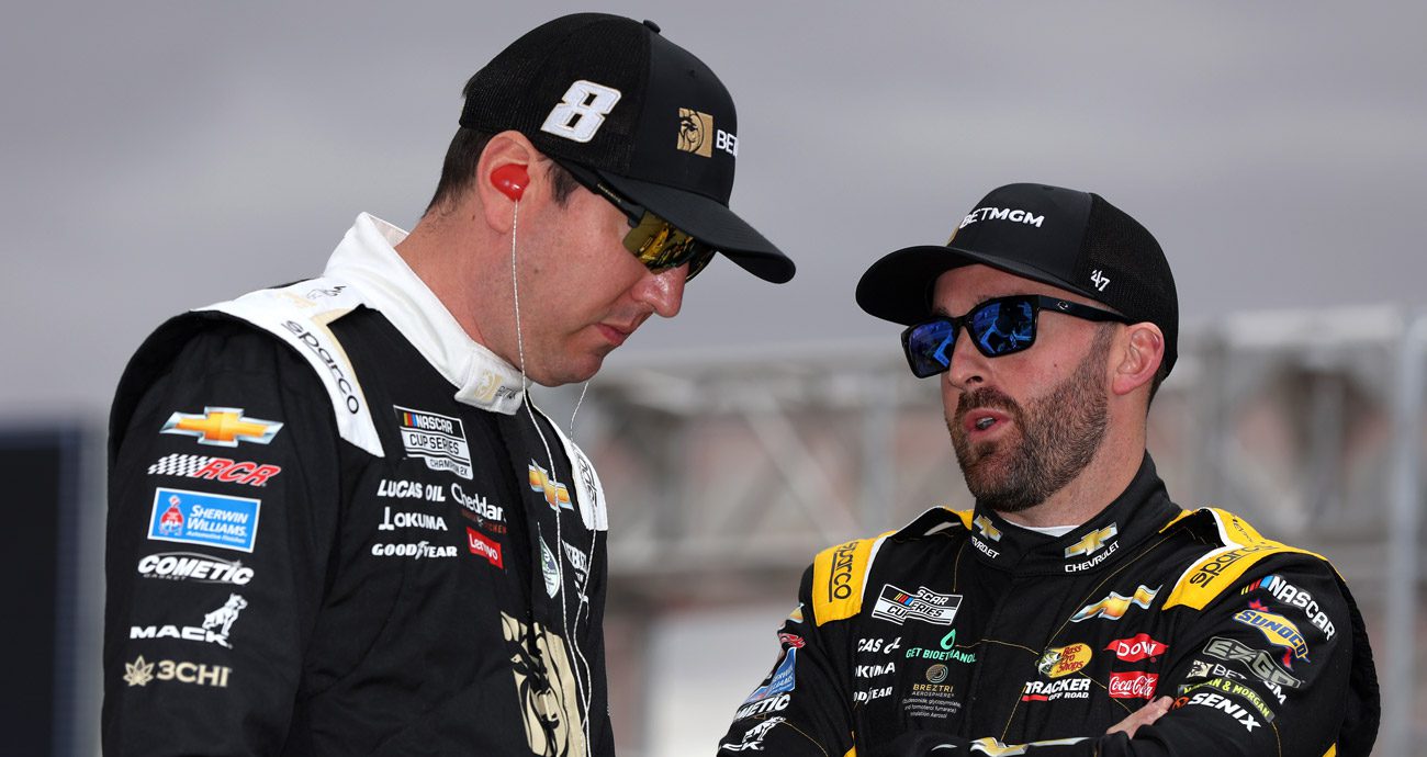 RCR drivers Kyle Busch and Austin Dillon talk during a NASCAR Cup Series session.
