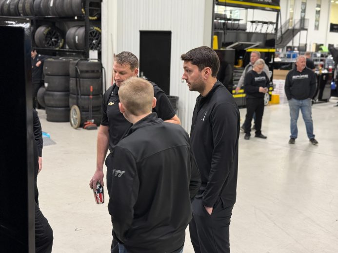 Michael McDowell and crew chief travis peterson in a meeting