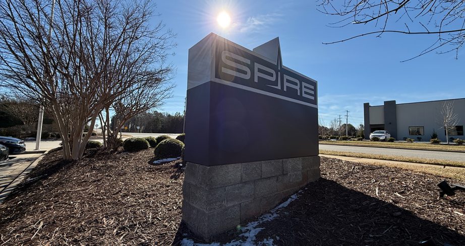 general view of spire motorsports sign from outside the shop
