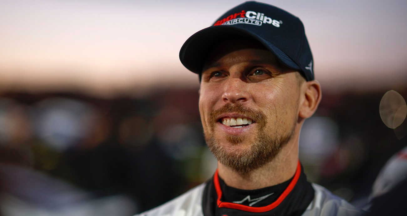 Denny Hamlin smiles on pit road