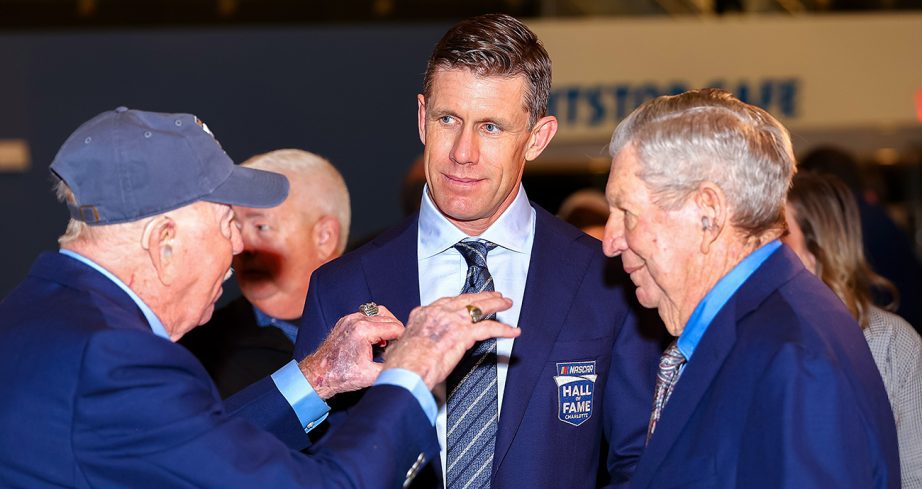 Carl Edwards listens to NASCAR Hall of Famers Red Farmer (L) and Donnie Allison.