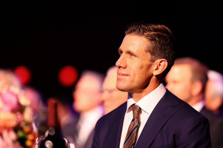 Carl Edwards looks on.