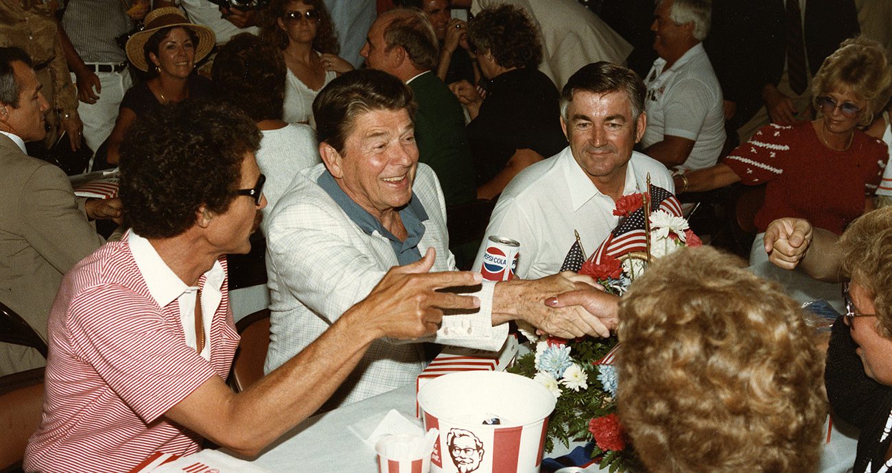 Richard Petty, President Ronald Reagan and Bobby Allison enjoy the picnic lunch.
