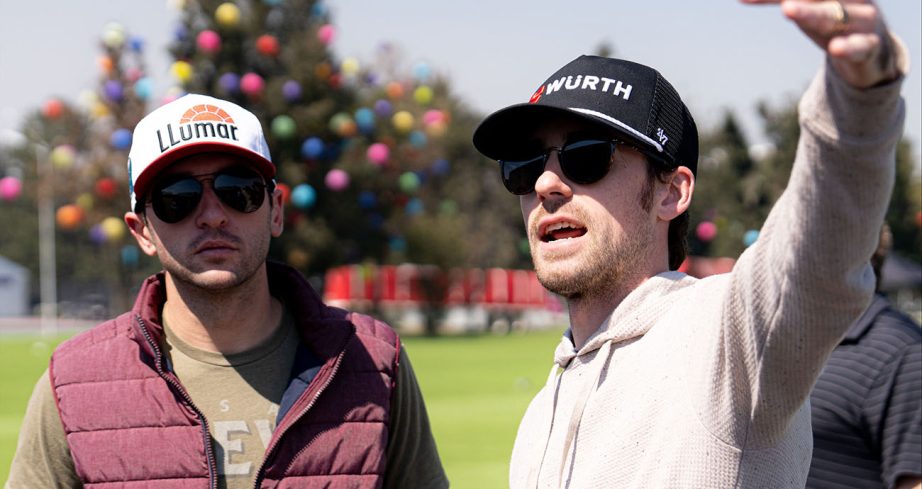 Ryan Blaney and Chase Elliott have a conversation.