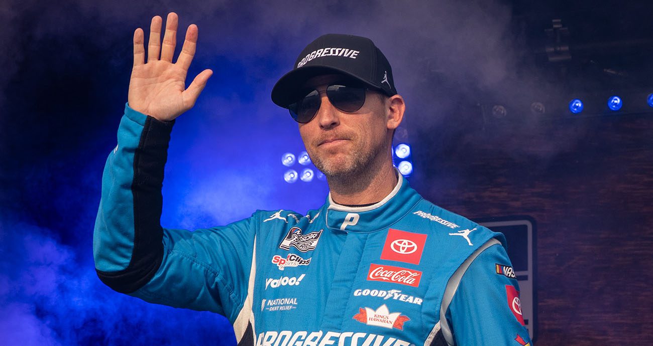 Denny Hamlin smiles and waves to crowd at Nashville.