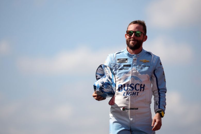 Ross Chastain walks across the stage before a NASCAR Cup Series race.