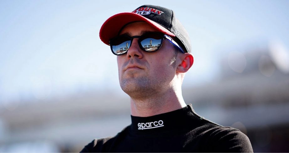 Austin Cindric looks on.