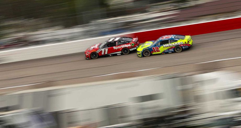Denny Hamlin (11) races in front of Ryan Blaney's No. 12 Ford at Darlington Raceway