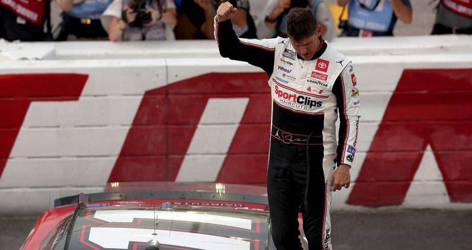 Denny Hamlin celebrates with a fist-pump after his Goodyear 400 victory at Darlington Raceway