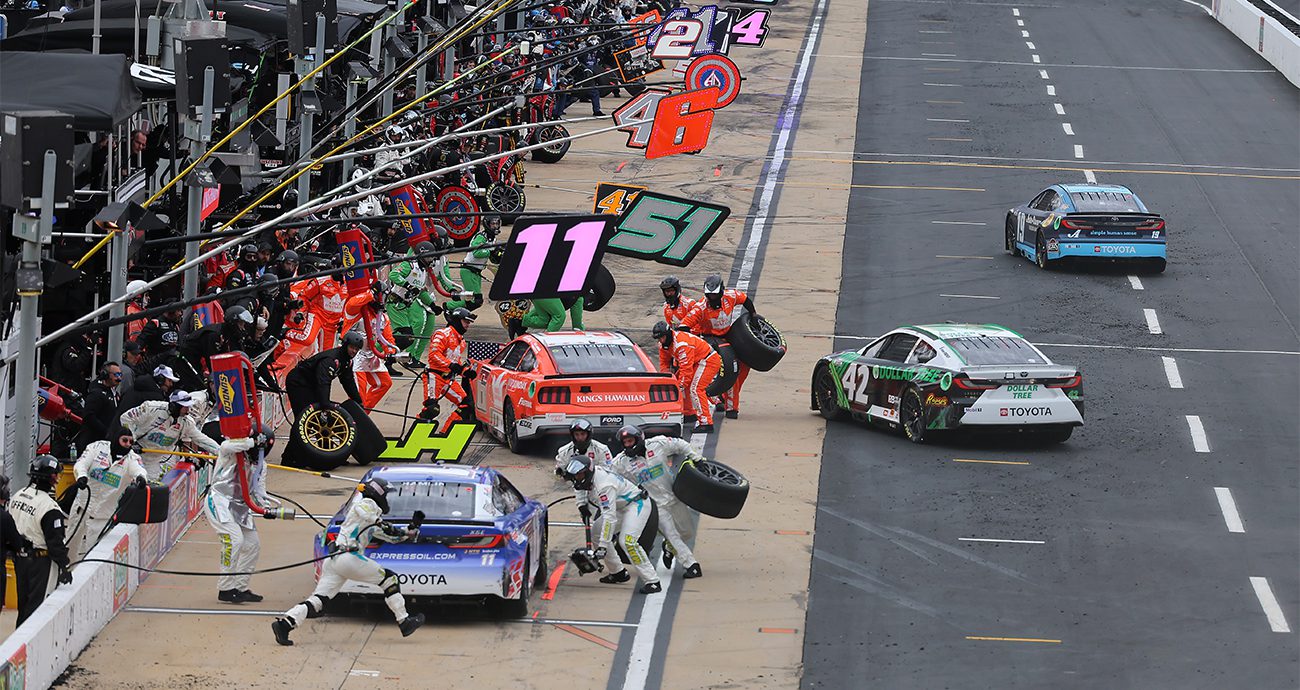 cars get serviced on pit road at bristol