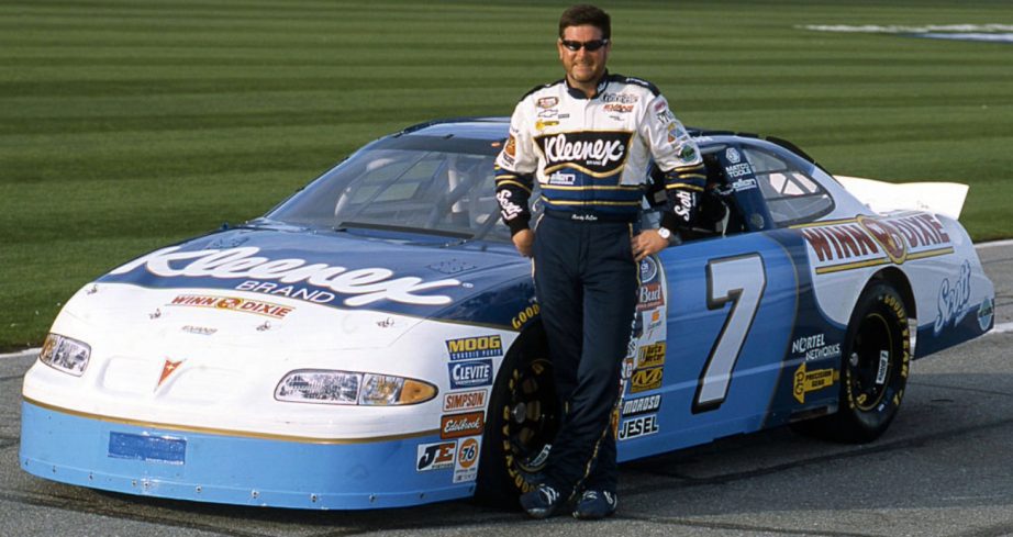 Randy LaJoie stands next to his car.