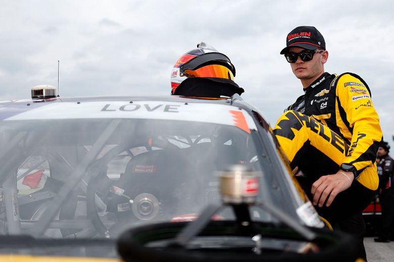Jesse Love climbs into his car at Talladega.