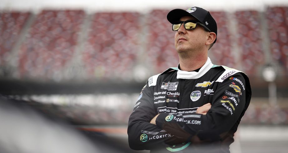 Kyle Busch looks on at Talladega Superspeedway.