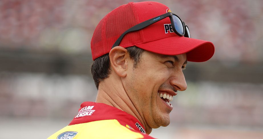 Joey Logano looks on at Talladega Superspeedway.