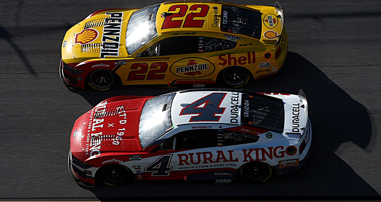 Noah Gragson races Joey Logano at Talladega Superspeedway.