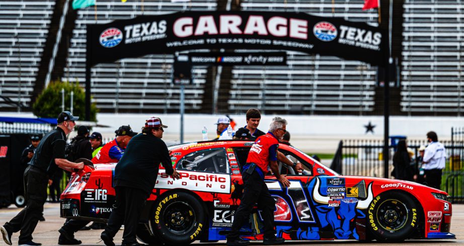 Jeremy Clements' crew pushes his car at Texas.