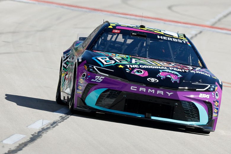 Riley Herbst drives at Texas.