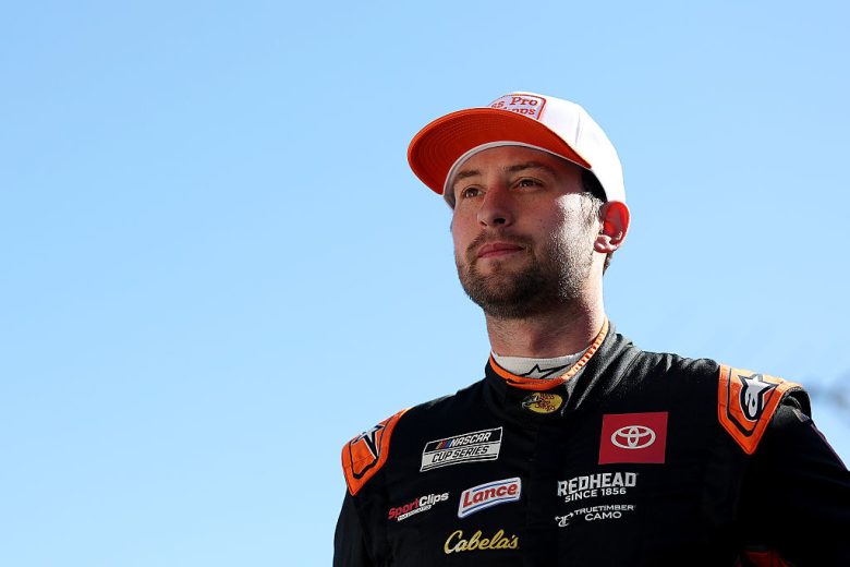 Chase Briscoe looks on.