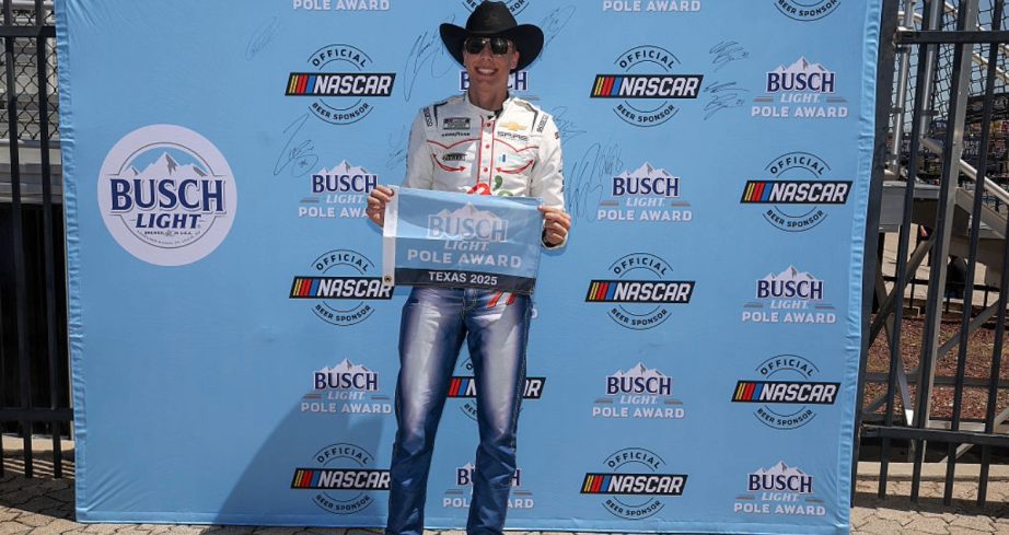 Carson Hocevar celebrates after winning the pole at Texas.