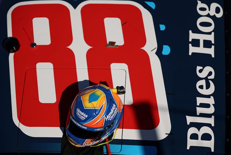Kyle Larson's helmet on top of his car art Texas.