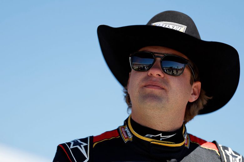 Noah Gragson looks on.