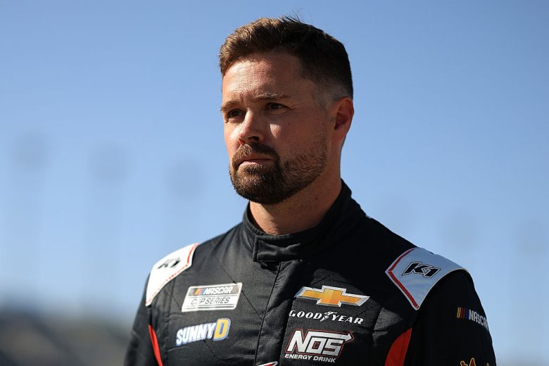 Ricky Stenhouse Jr. looks on.