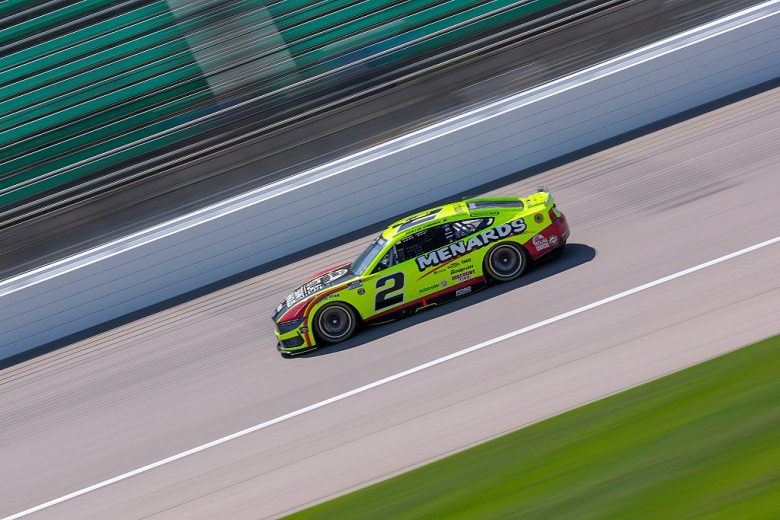 Austin Cindric drives at Kansas.