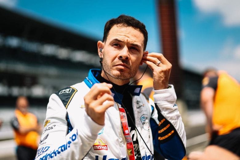 Kyle Larson puts in ear plugs ahead of practice at Indianapolis Motor Speedway.