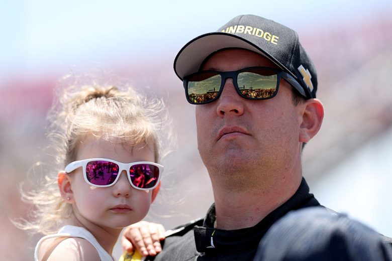 Kyle Busch and Lennix Busch look on at North Wilkesboro.