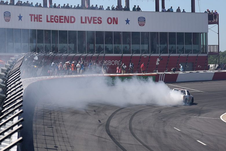 Chandler Smith does a burnout after winning at North Wilkesboro.