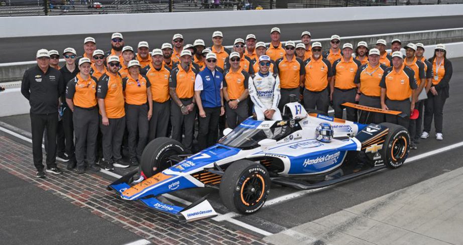 kyle larson poses on the indianapolis motor speedway pit road before qualifying