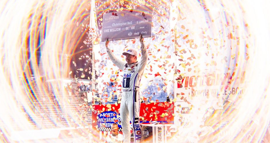 bell celebrates in Victory Lane