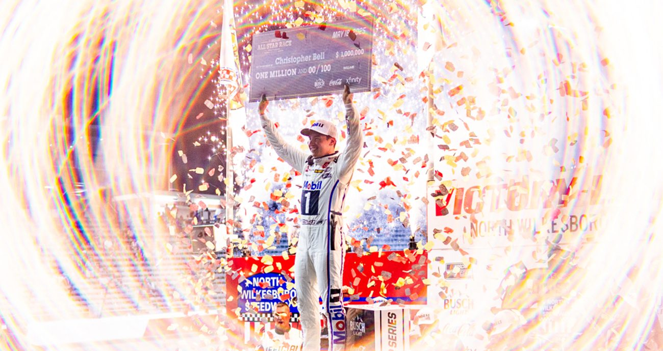 bell celebrates in Victory Lane