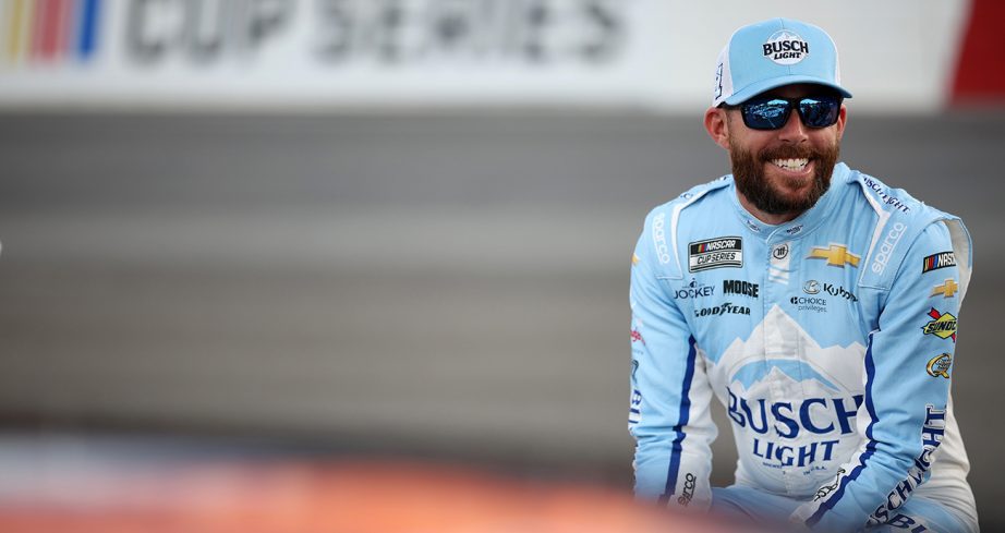 Ross Chastain smiles and looks on.