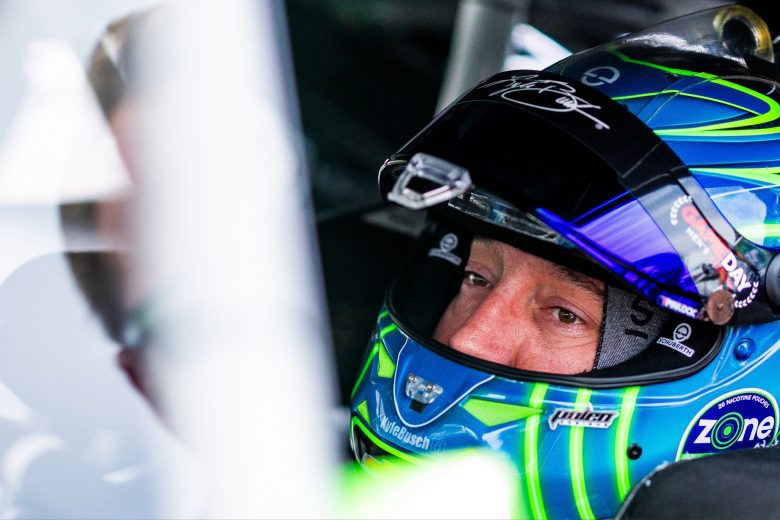 Kyle Busch looks on.