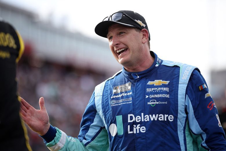 Michael McDowell looks on.