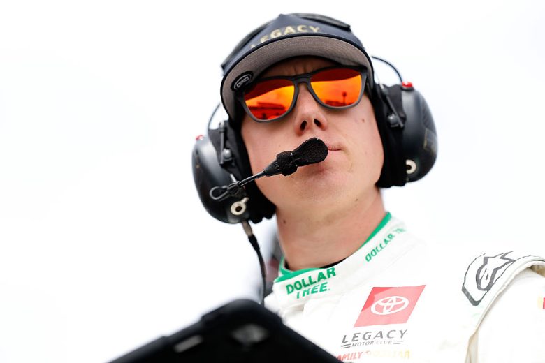 John Hunter Nemechek looks on.