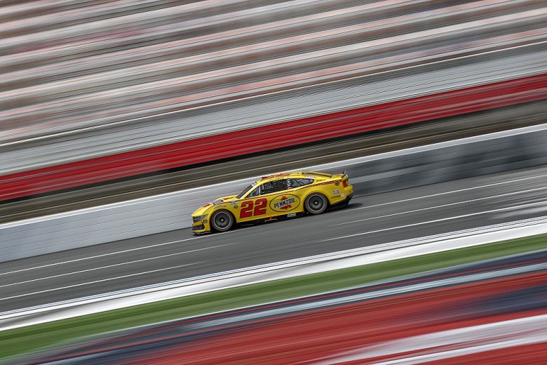Joey Logano drives at Charlotte.