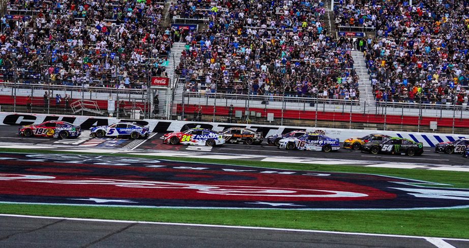 NASCAR Cup Series cars race at Charlotte Motor Speedway.