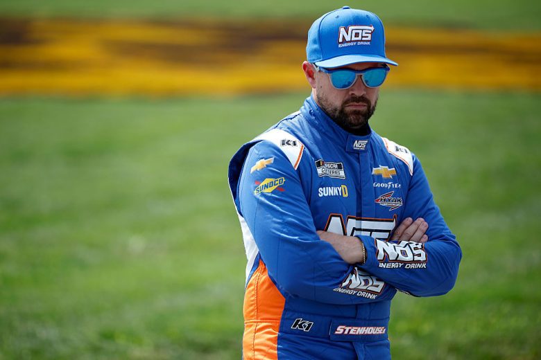 Ricky Stenhouse Jr. looks on.