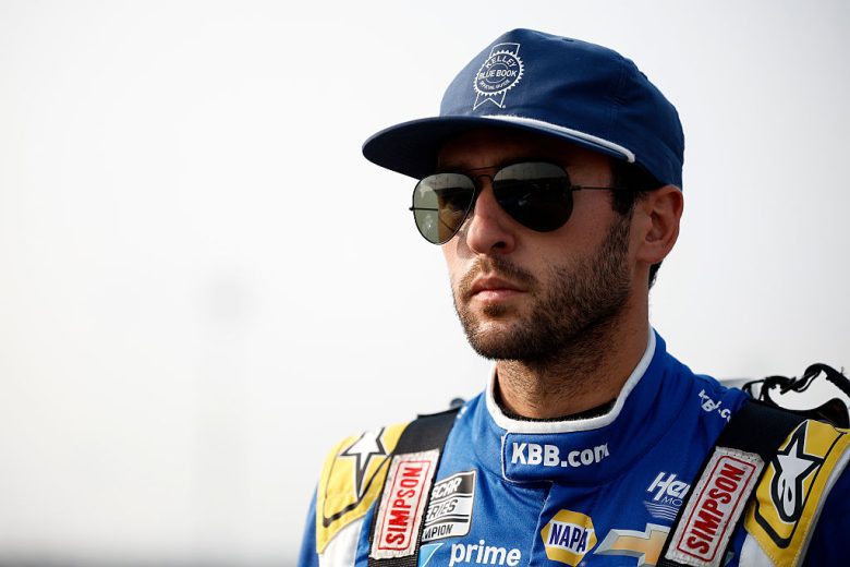 Chase Elliott looks on.