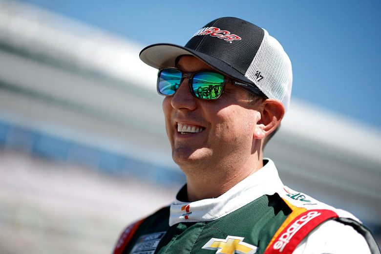 Kyle Busch looks on.