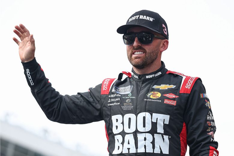 Austin Dillon looks on.