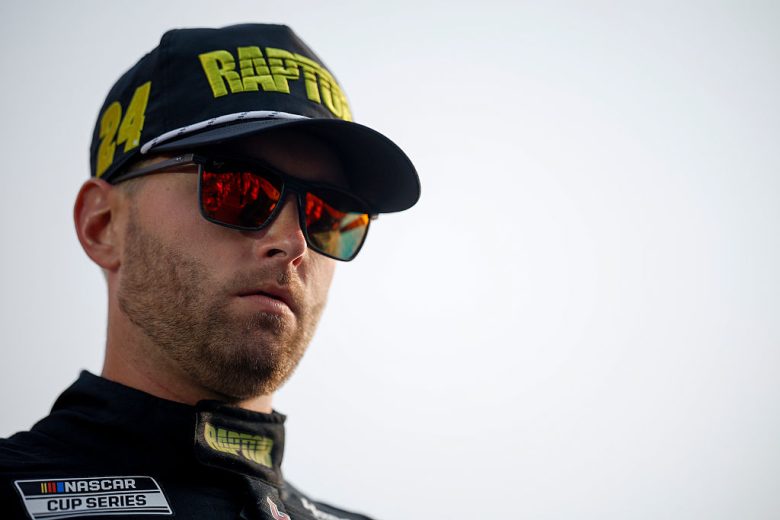 William Byron looks on.