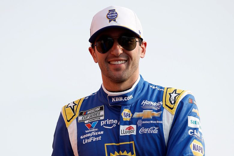 Chase Elliott looks on.